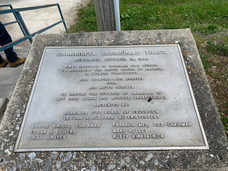 The bronze Sharrieffa Barksdale Track dedication plaque from October 18, 1984