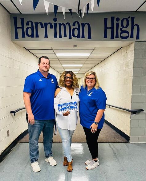 Sharrieffa Barksdale with supporters at Harriman High holding a Blue Devils license plate